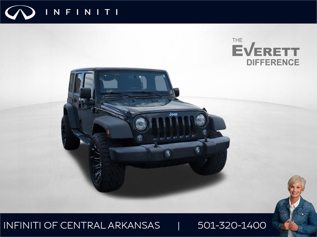2017 Jeep Wrangler Unlimited Sport in Rhino Clearcoat — front three-quarter view