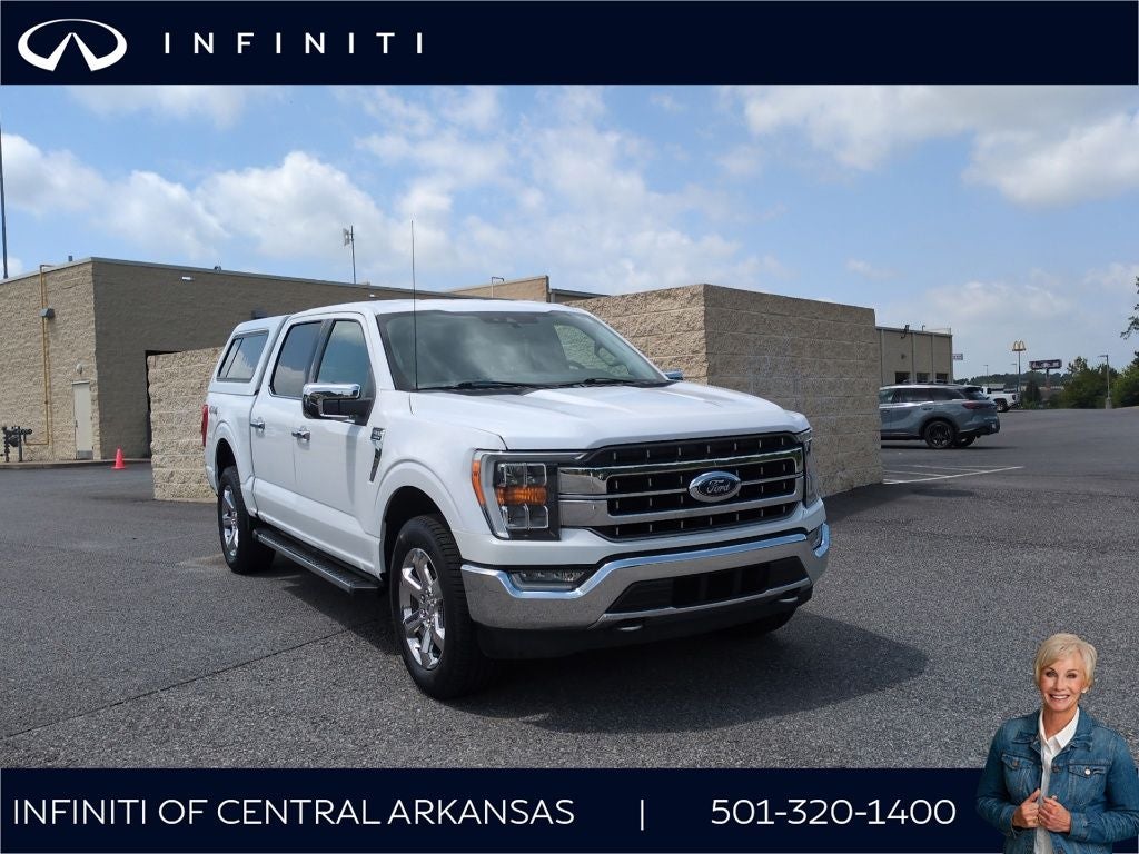 2021 Ford F-150 Lariat in Oxford White — front three-quarter view
