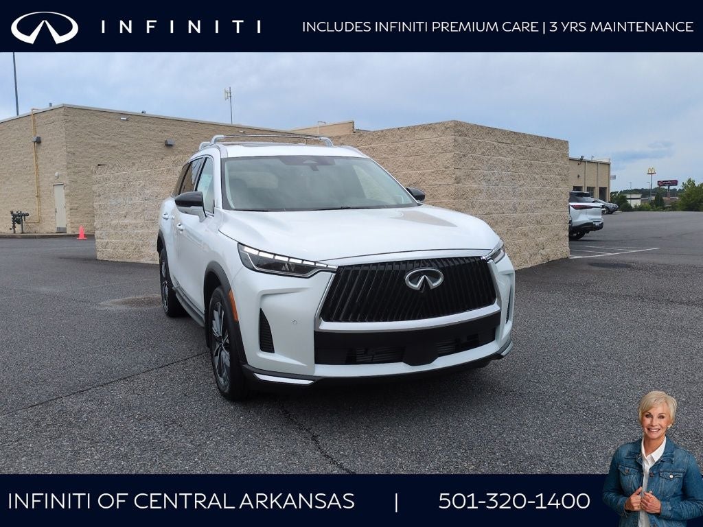 2027 INFINITI QX60 Luxe AWD in Radiant White — front three-quarter view