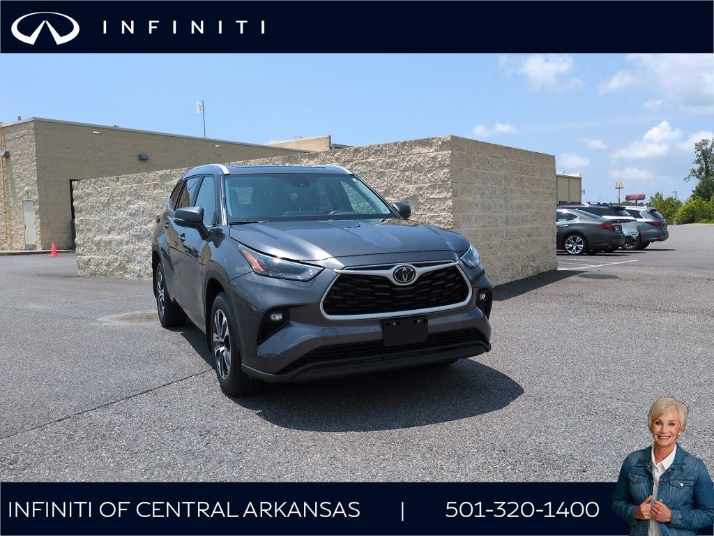 2023 Toyota Highlander XLE in Magnetic Gray Metallic — front three-quarter view